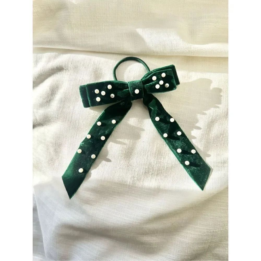 Emerald green velvet bow hair tie with pearl embellishment